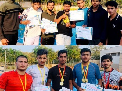 Anjuman boys bring laurels at University swimming competition