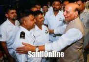Defence Minister Rajnath Singh interacts with Indian Navy Staff deployed on INS Gharial in Sri Lanka