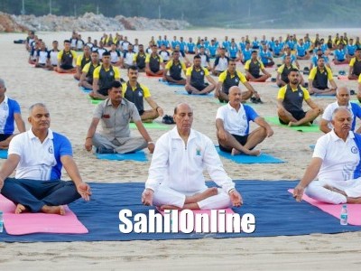 Rajnath Singh participates in yoga session with Navy personnel at Karwar Naval Base